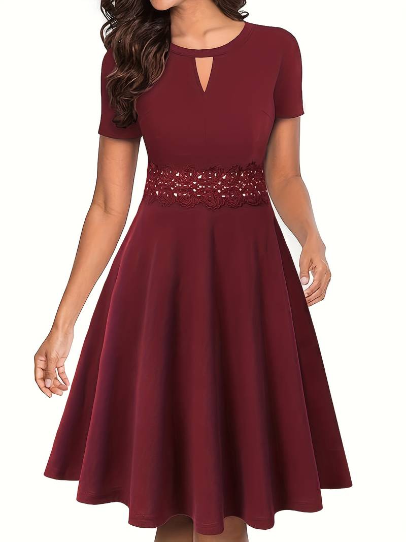 Elegant Blue Dress with Lace Details and Tailored Waist