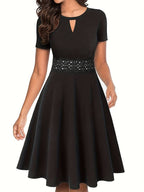 Elegant Blue Dress with Lace Details and Tailored Waist